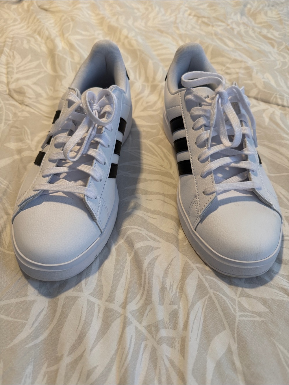 White Sneakers with Black Stripes